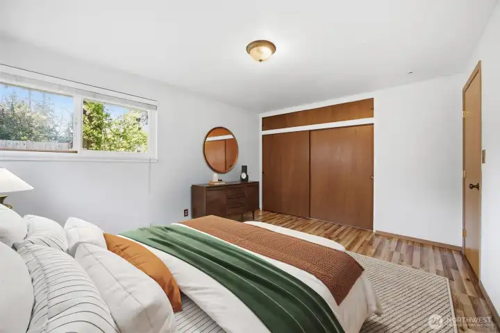 The second bedroom is also large and it looks to the side yard.