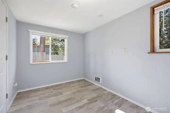 There is an extra finished room in the large garage that could be an office, workout area, studio or whatever your heart desires!