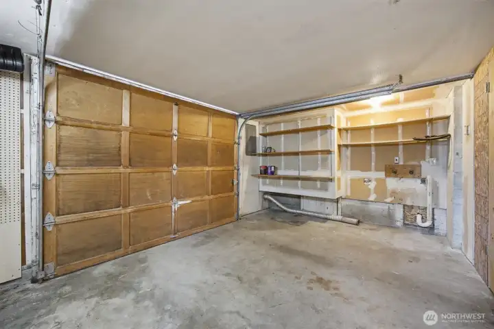 The garage has enough room for a small vehicle and/or motorcycle. The laundry hook-ups are also here in the garage.