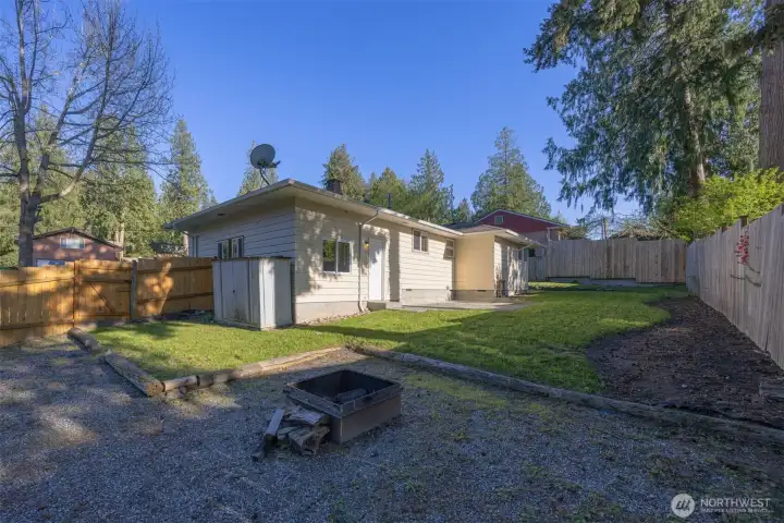 The rear yard is extensive and has unlimited potential for landscaping.