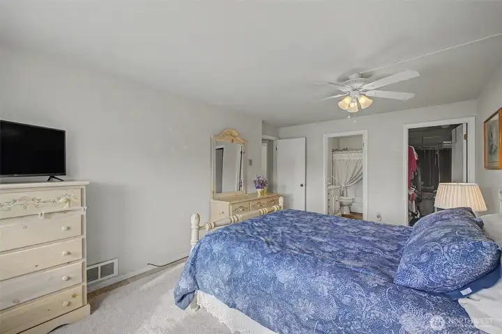 Primary Bedroom with bath and walk-in closet