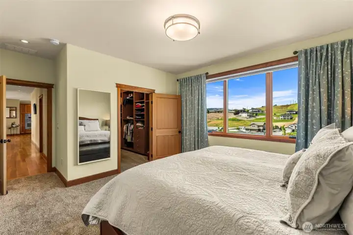 Spacious primary suite designed for comfort and tranquility