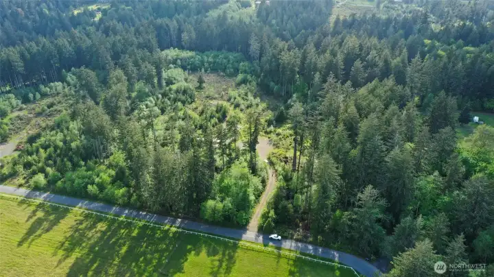 Schirm Road is paved, easement access road is gravel.  Lot B is to the left of the easement road.