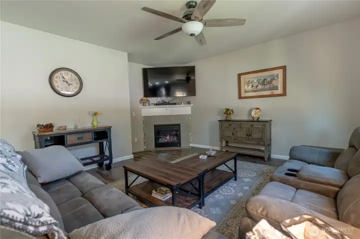 Living Room is open to the kitchen with a gas fireplace