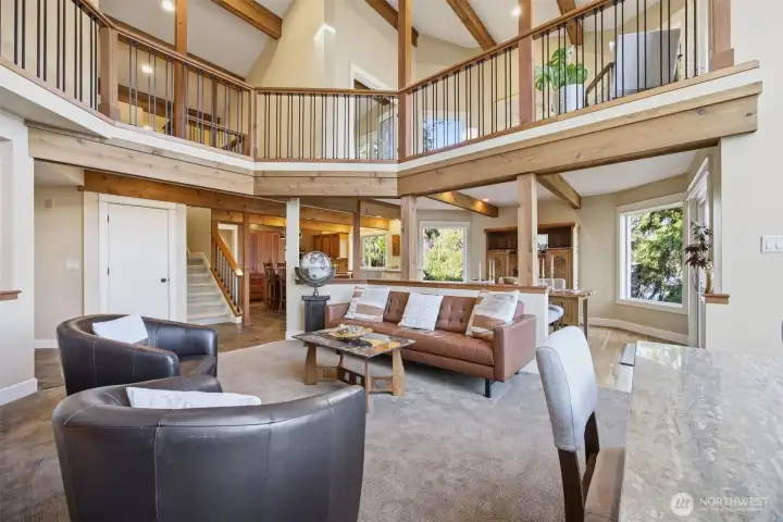Vaulted Ceiling leads to overlook upstairs.