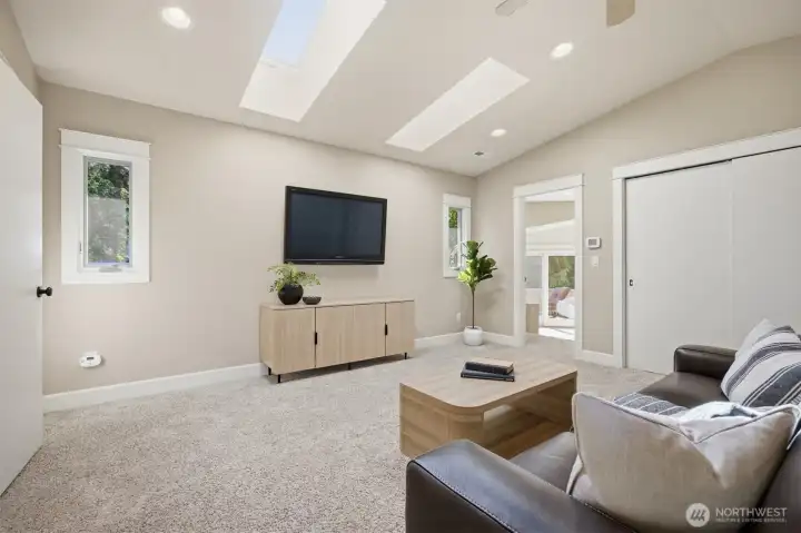 Bonus room leads to two additional bedrooms.