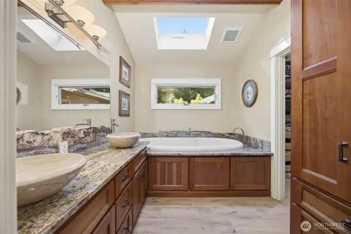 Primary bath with walk-in closet.