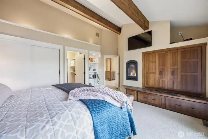 Another view of built-ins and fireplace.