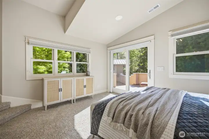 This bedroom has it's own sun deck and the bridge to the guesthouse.