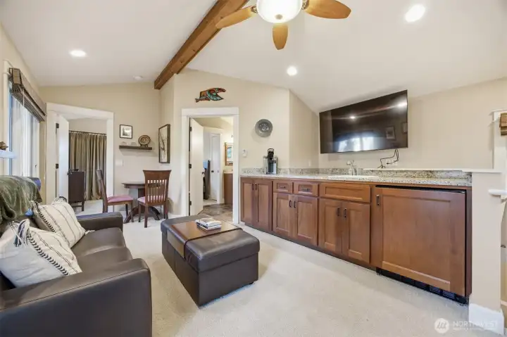 Guesthouse seating area and kitchenette.