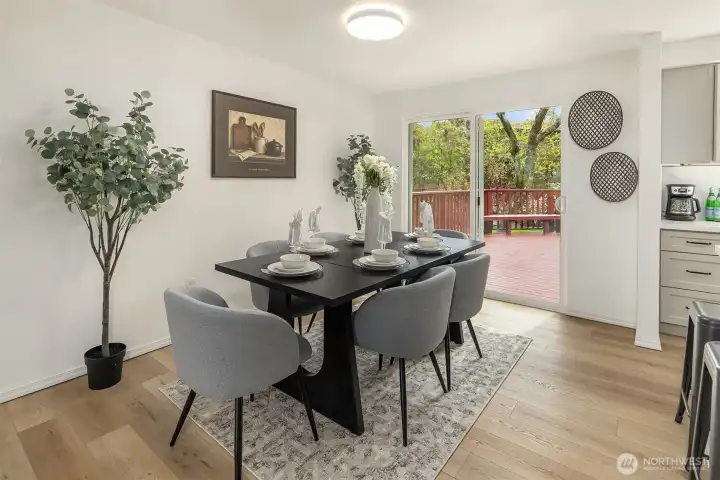 Formal dining space flows right out onto the South facing deck