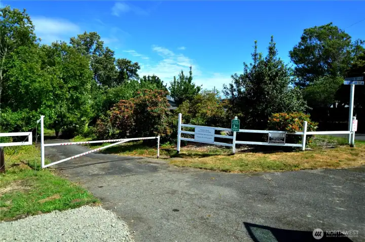 Entrance to Foot Path, Beach, and Marina