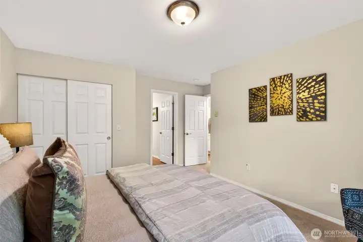Generous closet space and a smart layout give the primary suite easy everyday function, with direct access to the updated bath. New carpet adds warmth and comfort throughout the room.