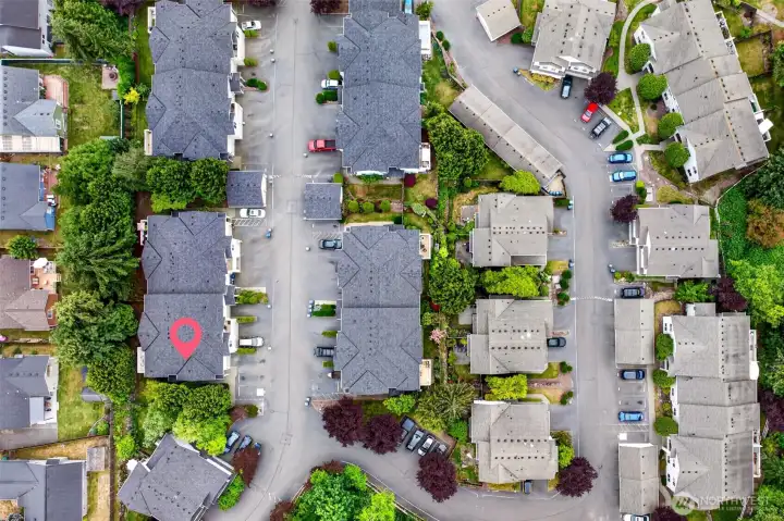 Set within the well-kept Somerfield community, the home enjoys an easy, low-maintenance lifestyle with convenient parking and tidy, tree-lined grounds. The layout offers a comfortable balance of privacy and connection throughout the neighborhood.