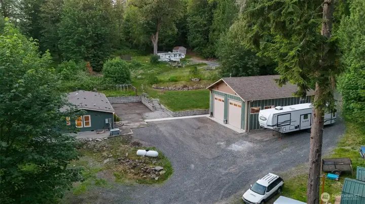 Private, park-like setting featuring a beautifully updated home, detached shop, expansive yard space, and room for RV parking, hobbies, and outdoor living. Private, park-like setting featuring a beautifully updated home, detached shop, expansive yard space, and room for RV parking, hobbies, and outdoor living.