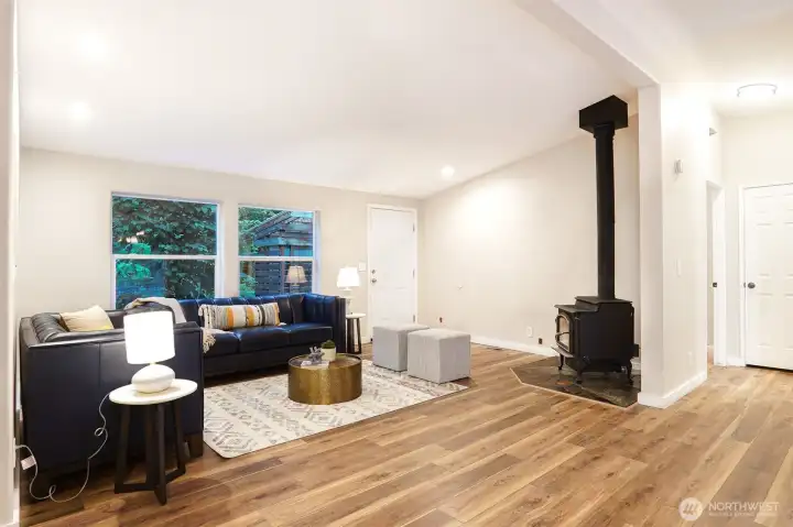 A freestanding wood stove adds warmth, character, and a cozy Northwest cabin feel. A freestanding wood stove adds warmth, character, and a cozy Northwest cabin feel.