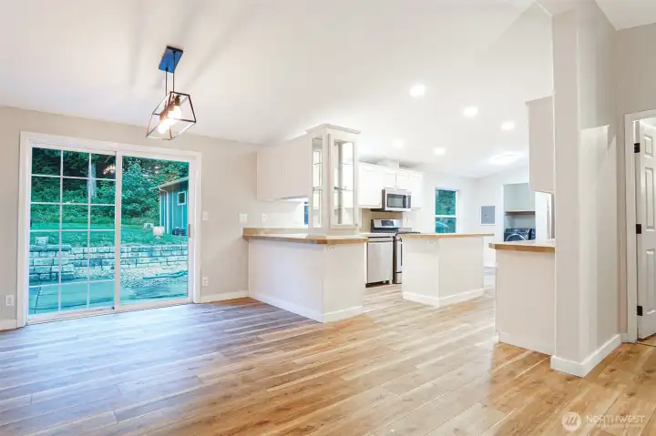 Enjoy meals with views of the private backyard and easy access to outdoor living spaces. Enjoy meals with views of the private backyard and easy access to outdoor living spaces.