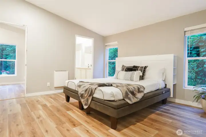 Primary suite provides plenty of room to relax and unwind after a day outdoors. Primary suite provides plenty of room to relax and unwind after a day outdoors.