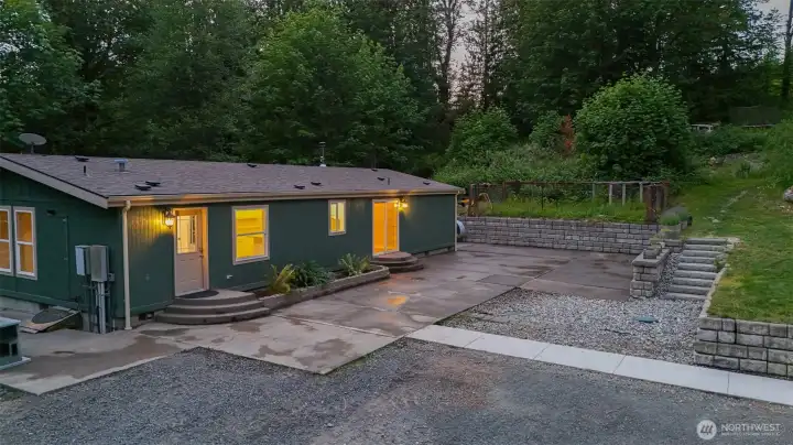Flat patio space with access from front door or dining slider door. Flat patio space with access from front door or dining slider door.