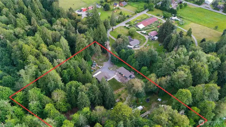 A unique opportunity to enjoy privacy, usable acreage, and versatile outbuildings all in one property. A unique opportunity to enjoy privacy, usable acreage, and versatile outbuildings all in one property.