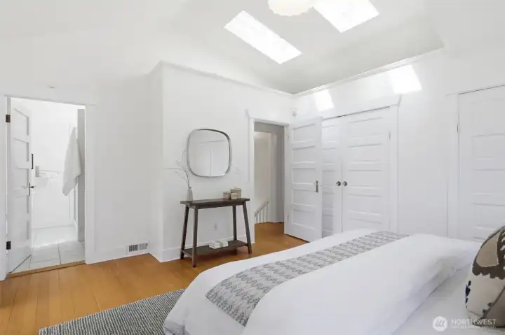 Primary bedroom with attached bathroom