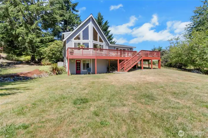 Chalet style home with walk out basement and expansive deck with a glimps of Mt Rainer, What would you do with all this land? Chalet style home with walk out basement and expansive deck with a glimps of Mt Rainer, What would you do with all this land?