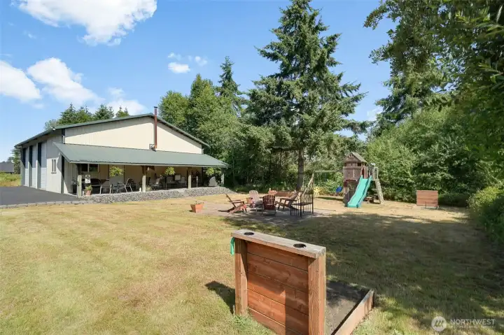 Recreational space inside shop steps out to a great covered patio and into the fire pit area. Horseshoes anyone? Recreational space inside shop steps out to a great covered patio and into the fire pit area. Horseshoes anyone?