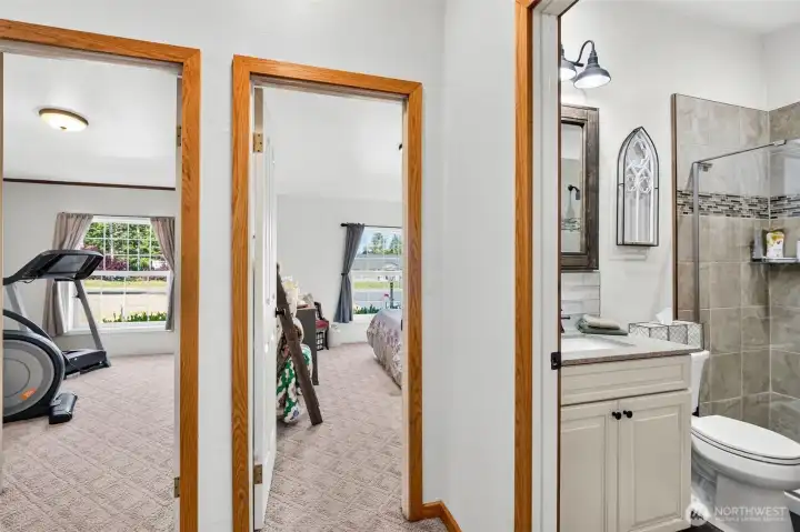 Two of the 4 bedrooms and second bath. Two of the 4 bedrooms and second bath.