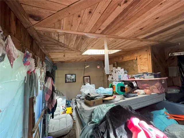 hot tub room that is enclosed off lake side of home with master bedroom- not of floor plan---