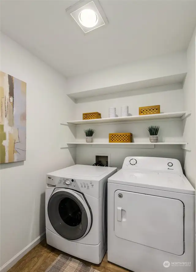 Laundry room is an actual room! Great for storage, laundry, and extra pantry space.