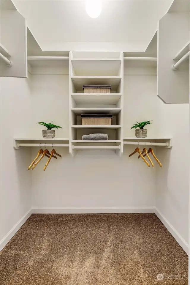 Large primary walk-in closet.