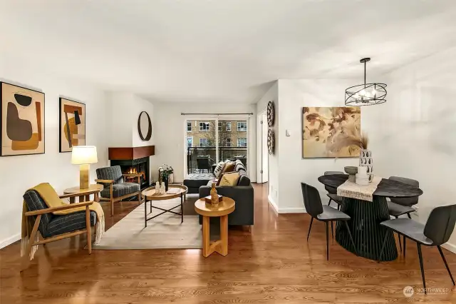 Spacious floorplan has great natural light, hardwood floors, and a homey feel.