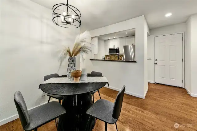 Dining room open to, but separate from the living and kitchen.