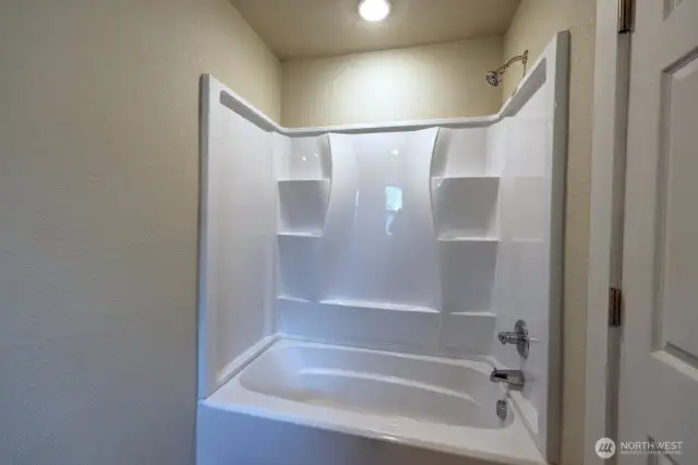 Main bathroom shower tub.