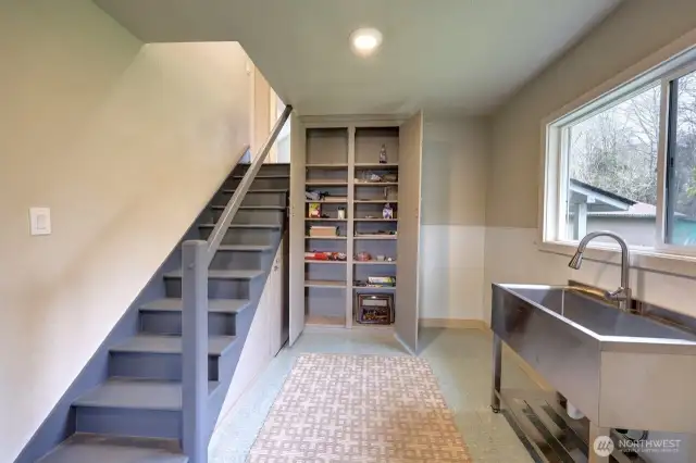 stairs to 2 more bedrooms