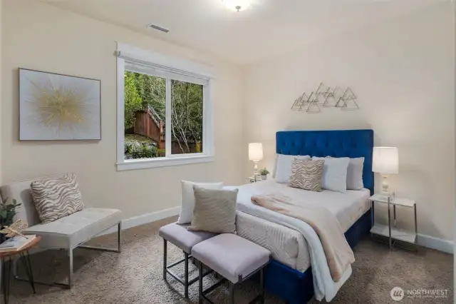 The main floor offers a versatile guest bedroom with an adjacent 3/4 bath with shower, while upstairs you'll find 3 spacious bedrooms and 2 baths.