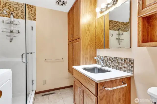 3/4 bathroom with extra deep sink. Perfect for hand washing necessities or smaller pets.