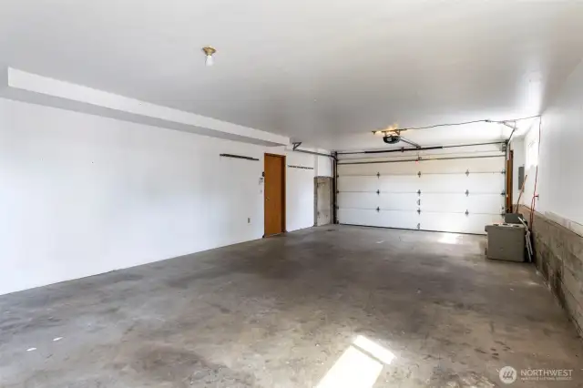 Extra deep garage can accommodate 4 cars tandem style.