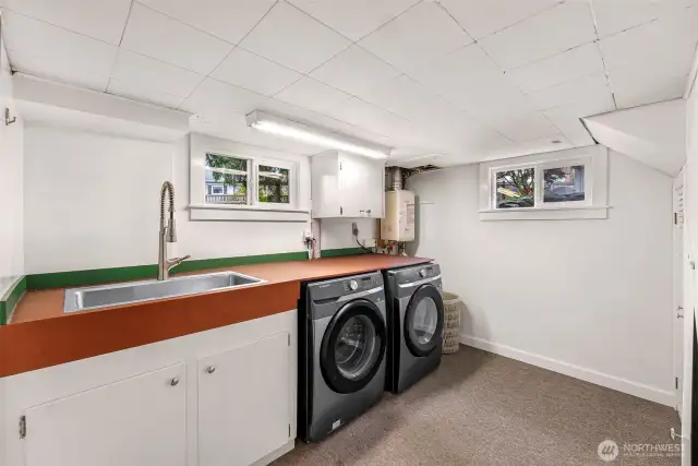 Spacious laundry just a few steps below kitchen