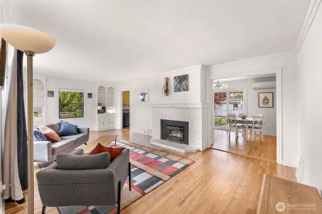 Gorgeously refinished hardwood floors throughout. Entry to kitchen/dining from living room
