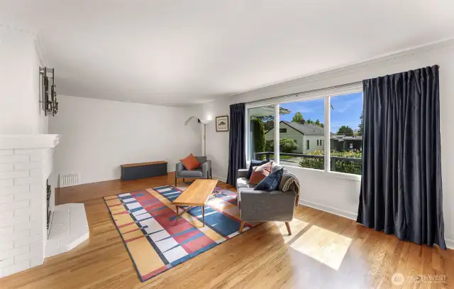 Bright sunny exposure with plenty of windows.