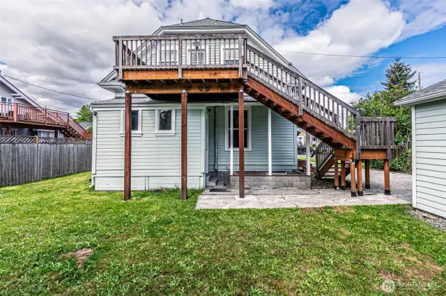 Access to Backyard from both Upstairs and Main Floor. Also access to Basement