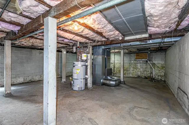 1000 sqft of unfinished Basement with Hot water Heater and Newer Furnace.