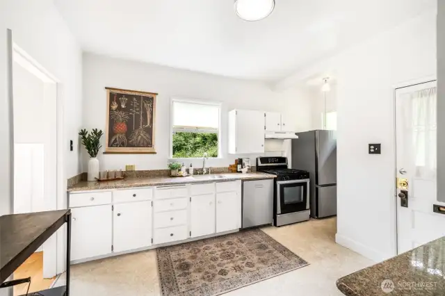 Updated countertops, fixtures, floors, and appliances...