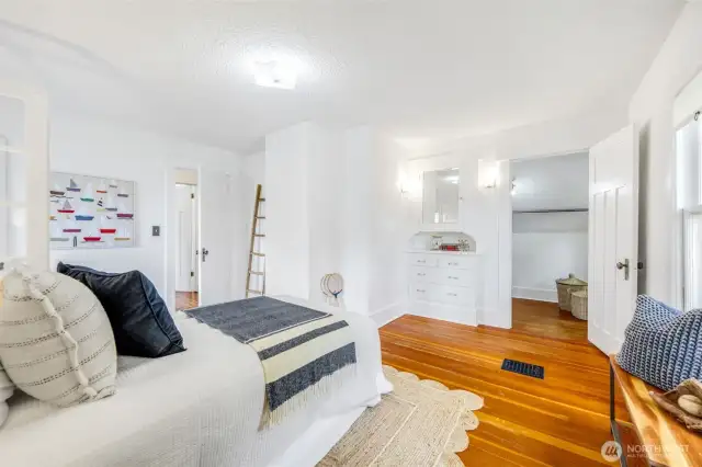 Two closets and a built-in dresser also grace this room.
