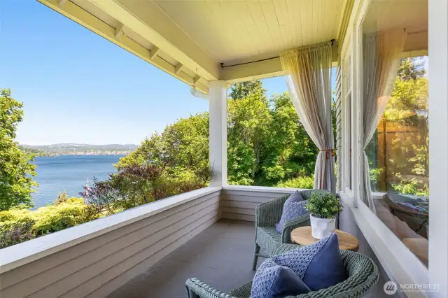The front porch is an incredible spot to soak in the lake, mountain and garden views.