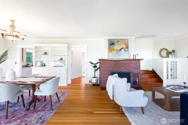 An open, light-filled space greets you upon entering from the front door on the porch.