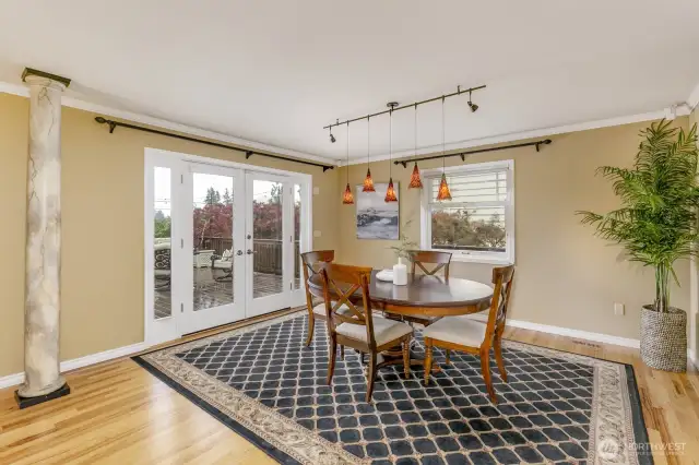 Formal dining room with french door to large deck.