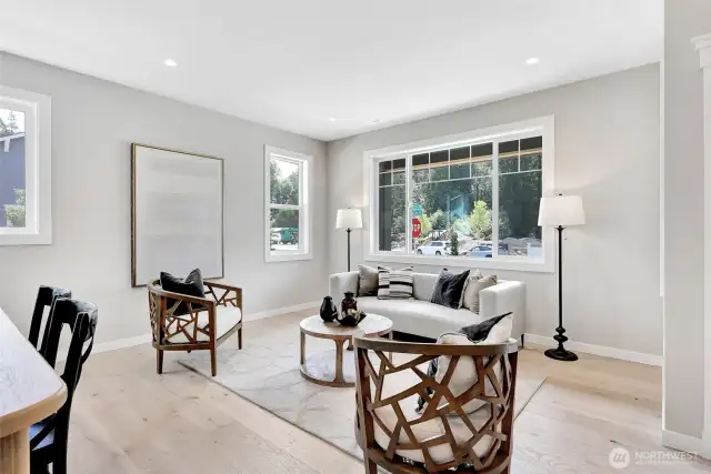 Entry, living & dining room.Previous built Peak house. Finishes may be different.