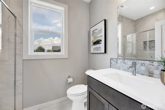 Main floor 3/4 bath. Previous built Peak house. Finishes may be different.